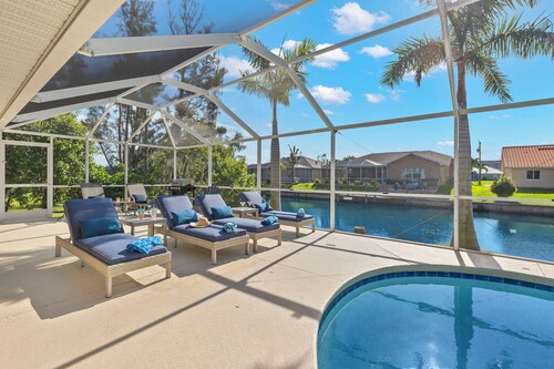 Villa Evelyn's Palms - Beautiful views on a Gulf-access canal! Heated pool w/spa - SWFL Rentals