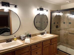 Combined shower/tub, hair dryer, towels, soap