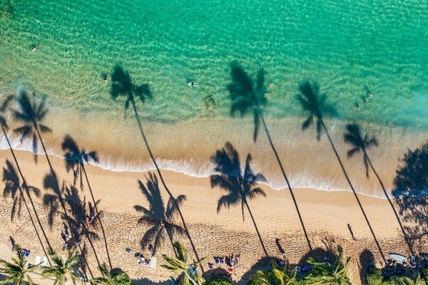 On the beach, sun loungers, beach towels
