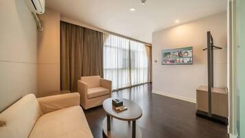 Desk, blackout drapes, iron/ironing board, bed sheets