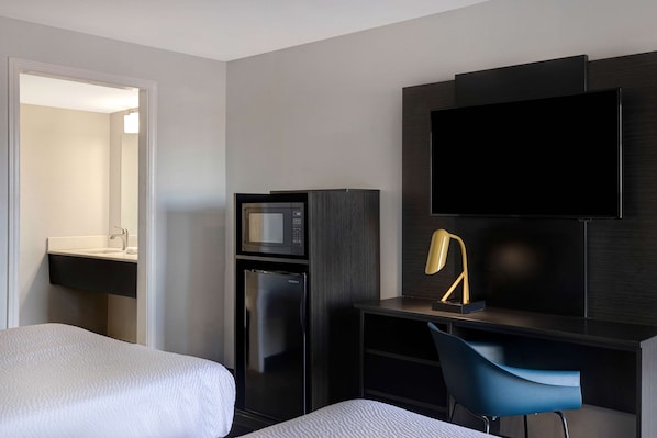 Desk, laptop workspace, free WiFi, bed sheets