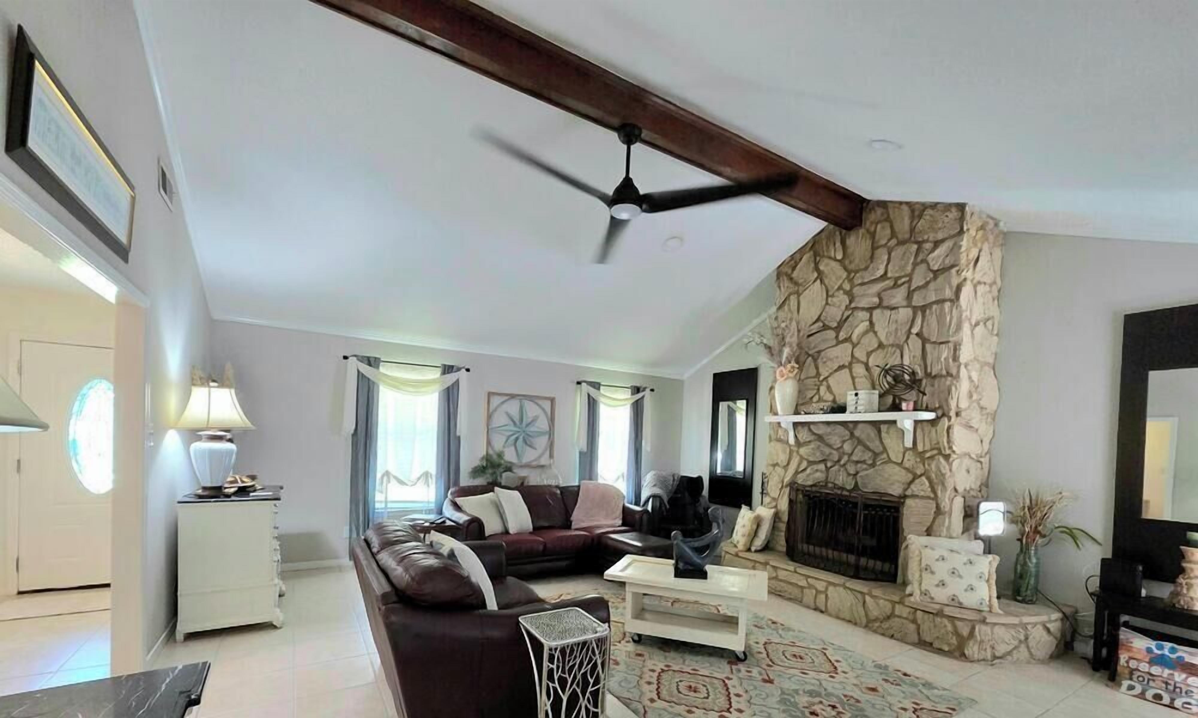 fireplace, interior, indoor, climate control, couch, living area, television