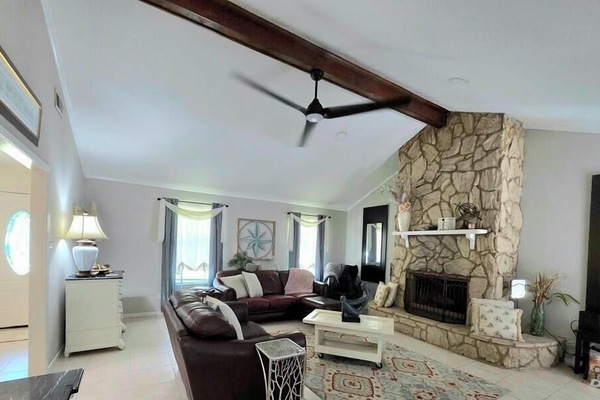 fireplace, interior, indoor, climate control, couch, living area, television