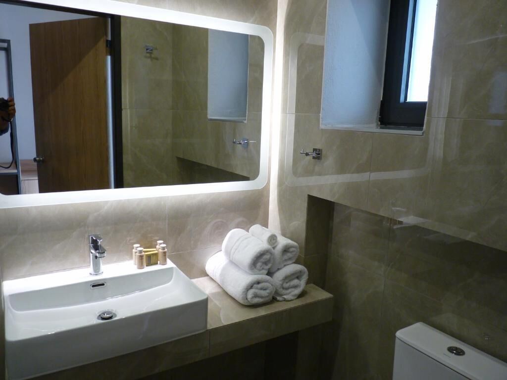Standard Double or Twin Room | Bathroom | Shower, hair dryer, slippers, towels