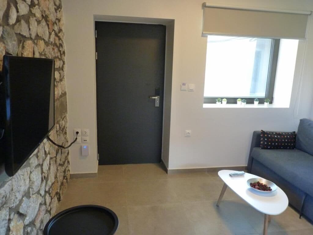 Standard Suite | Living area | Plasma TV