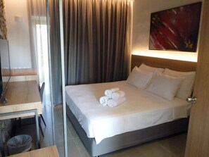 Habitación doble estándar | Caja de seguridad en la habitación y insonorización