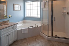 Bathtub, hair dryer, soap, shampoo
