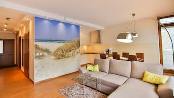 Basic Apartment | Living area | 40-inch flat-screen TV with cable channels, TV