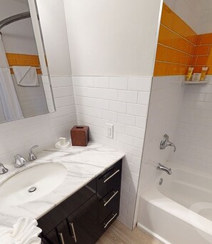 Combined shower/bathtub