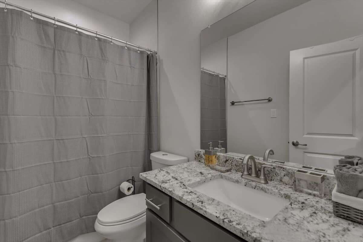 Bathtub, hair dryer, towels