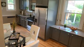 Coffee/tea maker, fridge, microwave, oven