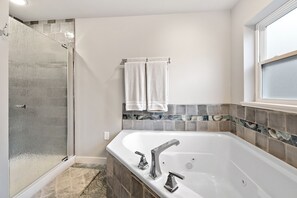 Bathtub, hair dryer, towels