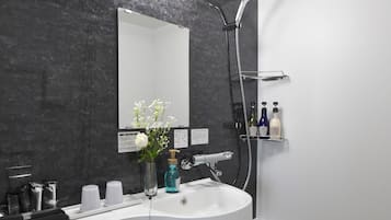 Combined shower/bathtub, hair dryer, slippers, electronic bidet