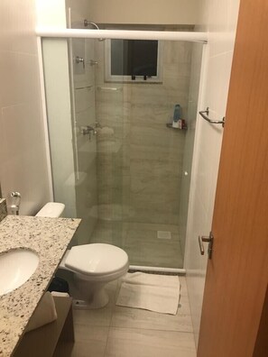 Shower, towels, toilet paper