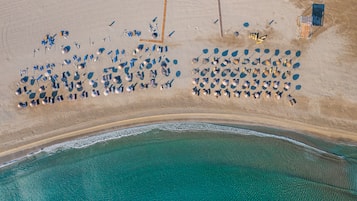 Beach nearby, sun loungers