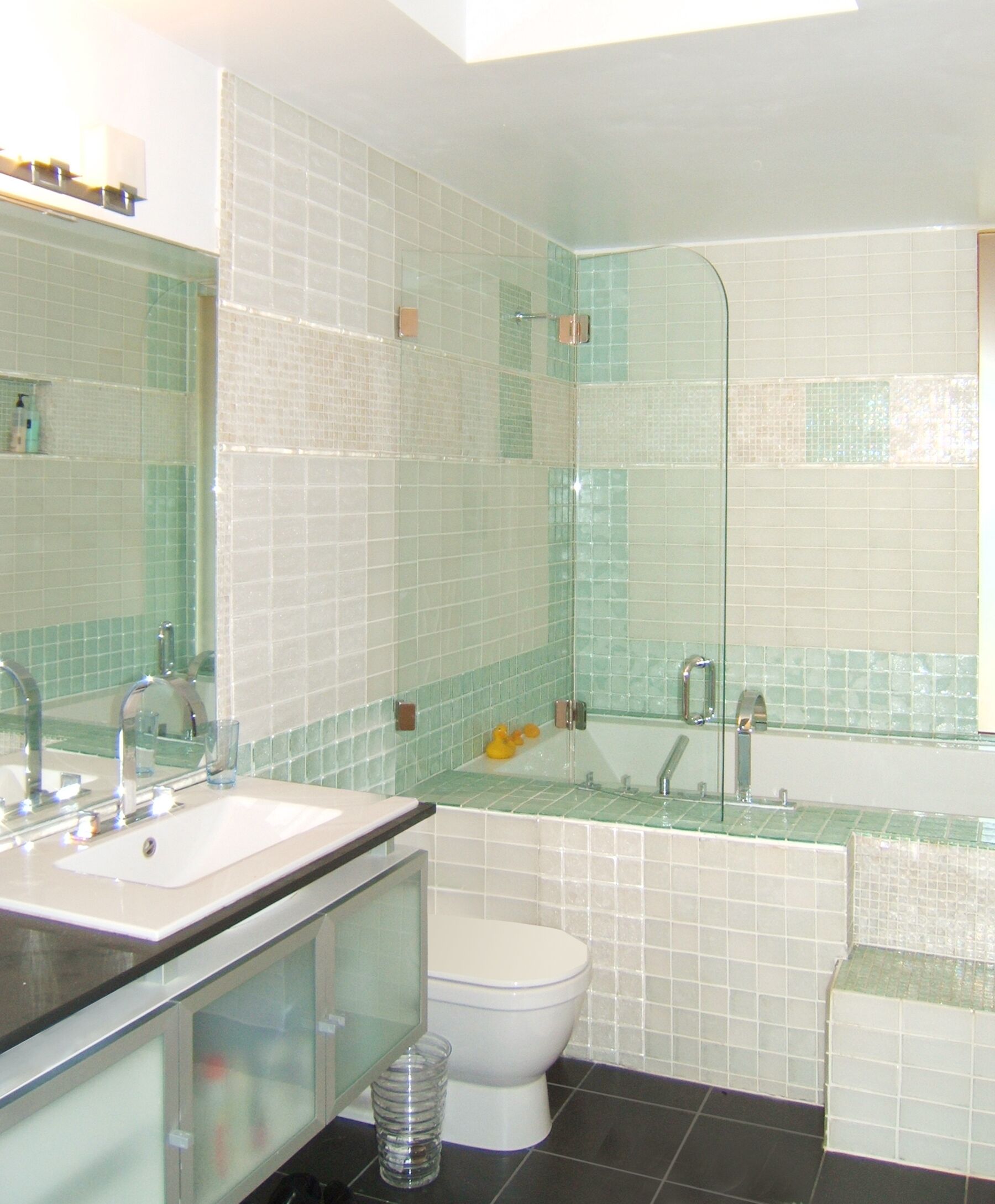 Combined shower/tub, hair dryer, towels, soap