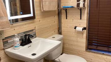 Combined shower/tub, hair dryer, towels, soap