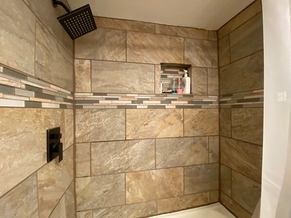 Combined shower/tub, hair dryer, towels, soap