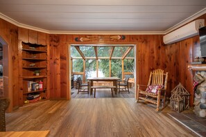 Cabin | Living room | 50-inch flat-screen TV with cable channels, TV, fireplace - Koi Story Cabin (Maple Valley)