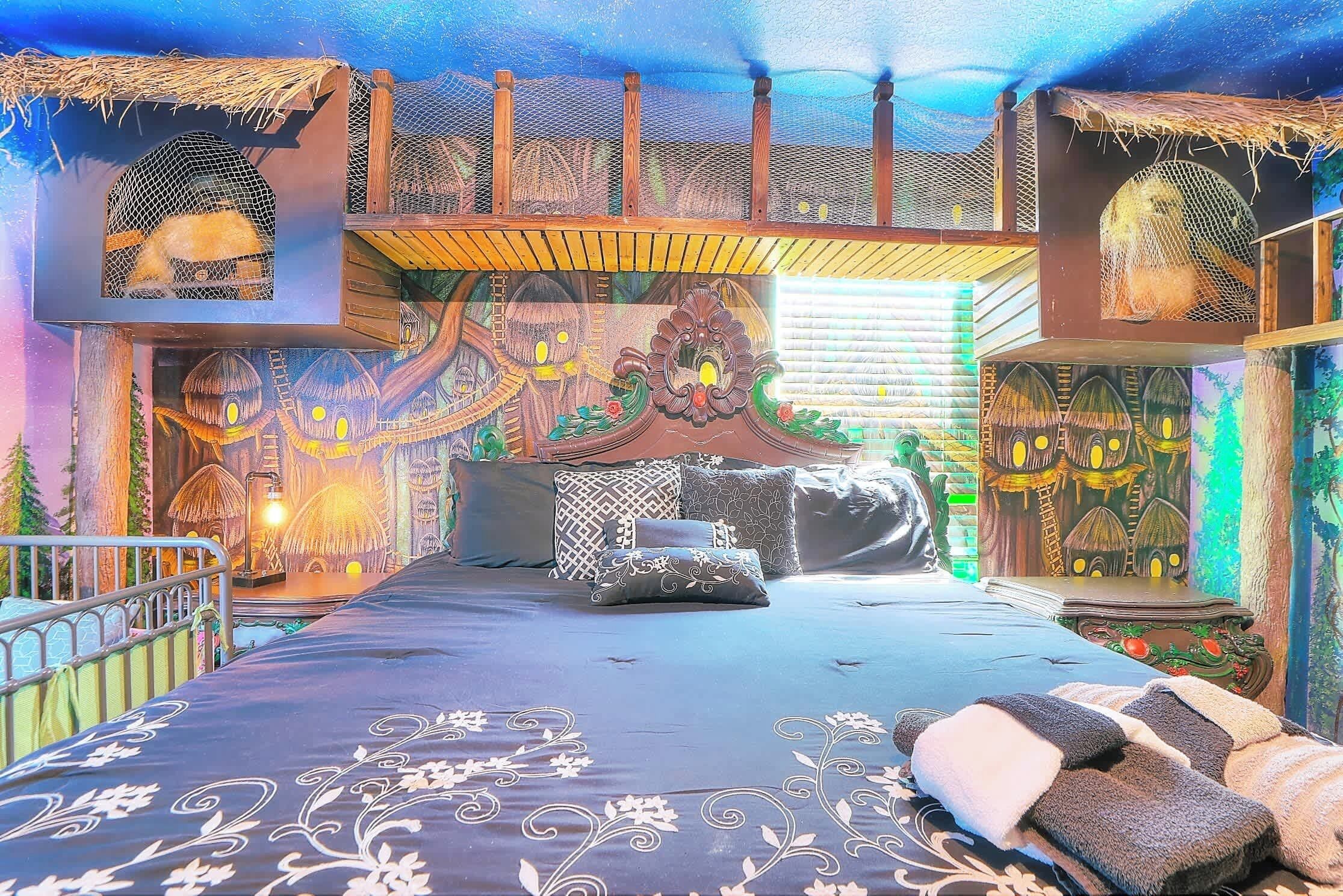 Upper: Bedroom 5: Continuing through the Star Wars wing, welcome to the planet Endor. You will love this incredible 360 degrees interactive  room will make you feel like you’re sleeping in the village . Rest in your king size S&F bed with smart TV. 