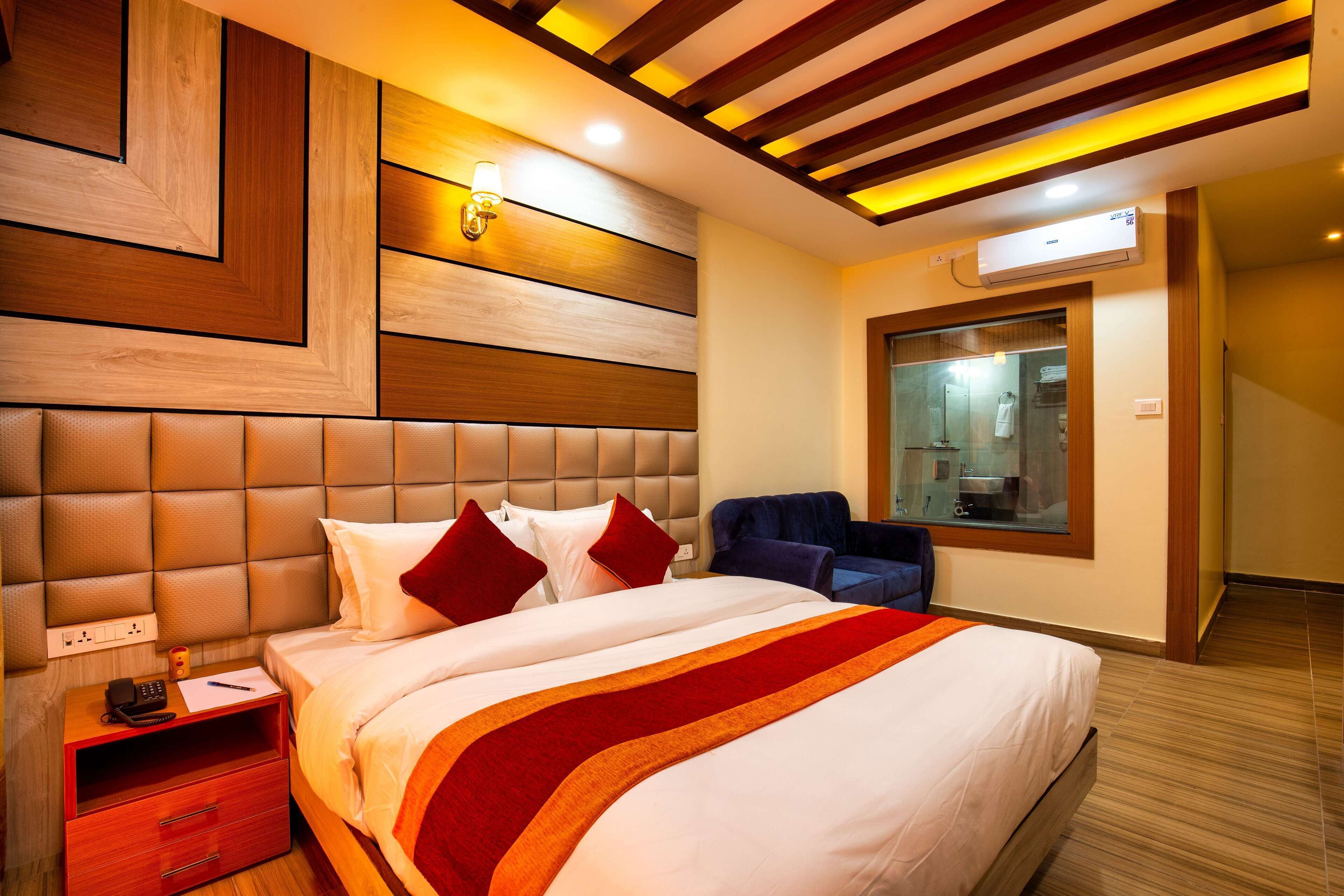 エグゼクティブ ルーム | ミニバー、アイロン / アイロン台、WiFi (無料)、ベッドシーツ