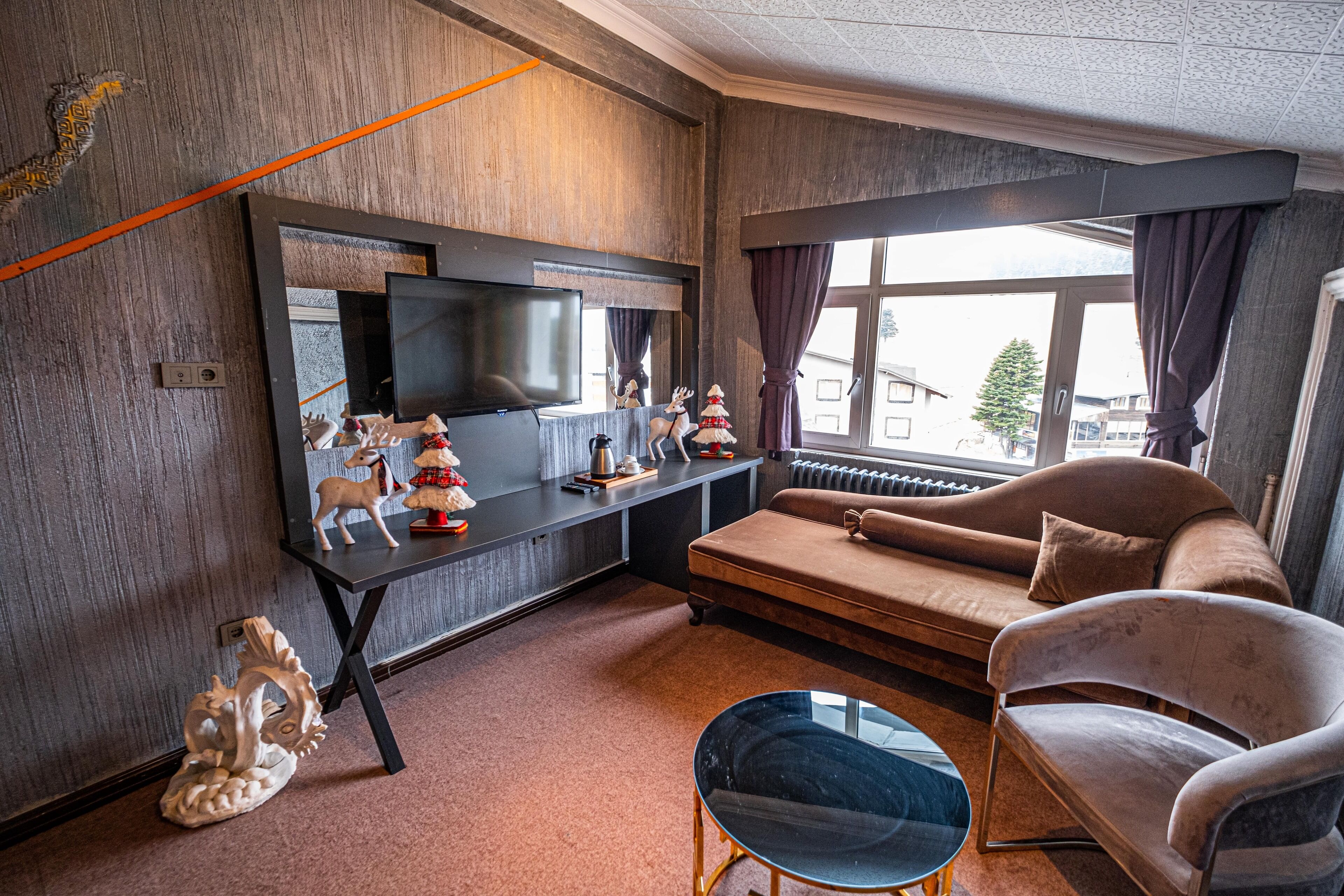 Deluxe-Zimmer | Wohnbereich | LCD-Fernseher, Fußbodenheizung