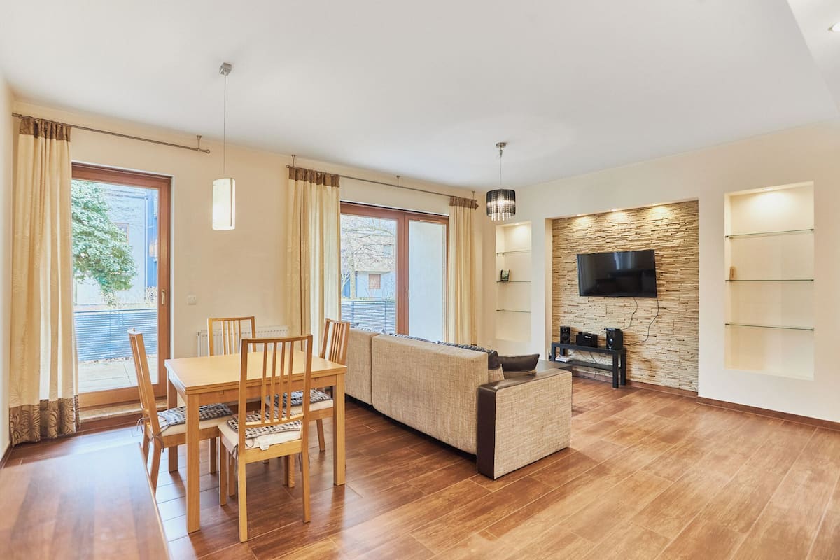 City Apartment | Living area | 42-inch TV with digital channels