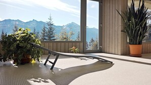 A balcony with a view of mountains, a hammock, and potted plants. - Located in Les Collons 1850, only 50 meters from the ski-lifts "La Joc" and "Petit Vallon" (crossbow (Thyon-Les Collons)