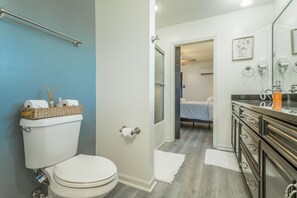A bathroom with a toilet, a sink, and a shower area. - ✤VILLA CATALINA✤ Private Studio #103 (Chattanooga)
