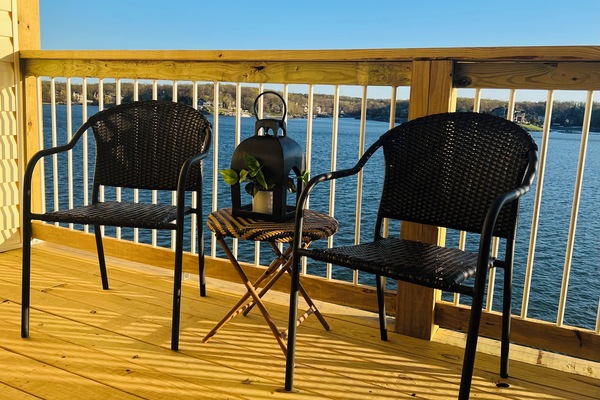 New covered deck with plenty of seating, grill & fan