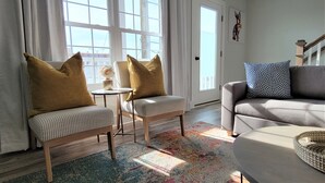 A living room with a sofa, two armchairs, a small table, and a patterned rug. - ♡ Beautiful Modern & Luxury Beach Home Next to Boardwalk With Bay View (Ocean City)