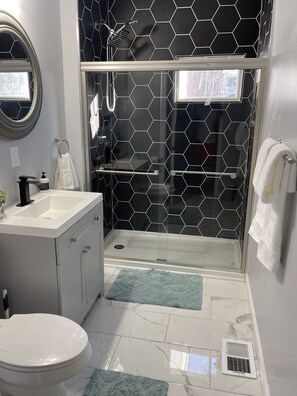 Bathtub, hair dryer, towels