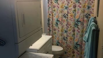 Combined shower/tub, hair dryer, towels, soap