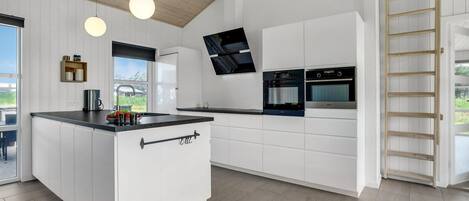 Fridge, dishwasher, coffee/tea maker