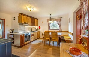 Fridge, stovetop, dishwasher, coffee/tea maker