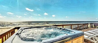Great price!Beachfront with Stunning gulf view from this Great home with hot tub