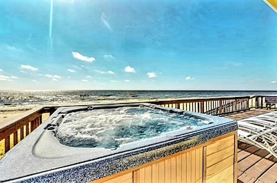 Great price!Beachfront with Stunning gulf view from this Great home with hot tub