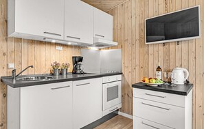 Frigorífic, placa de cuina i cafetera i tetera 