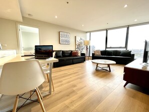 Panoramic Apartment, 2 Bedrooms | Living area | 42-inch Smart TV with digital channels, TV, Netflix - Readyset Apartments Stadium South (Docklands)