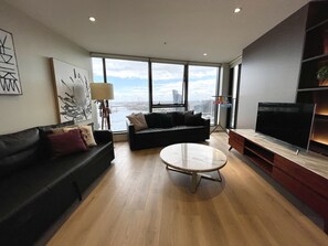 Panoramic Apartment, 2 Bedrooms | Living room | 42-inch Smart TV with digital channels, TV, Netflix - Readyset Apartments Stadium South (Docklands)