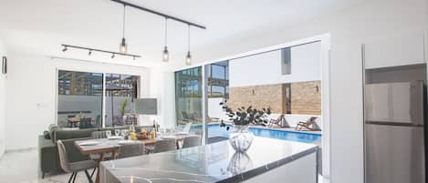 Villa, 4 Bedrooms, Terrace, Garden View | Private kitchen | Microwave, coffee/tea maker