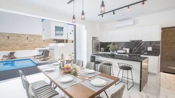 Villa, 4 Bedrooms, Terrace, Garden View | Private kitchen | Microwave, coffee/tea maker