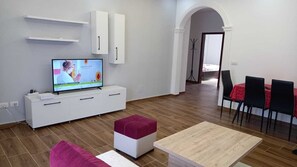 Apartamento, 2 quartos, sacada, vista para a cidade | Sala de estar