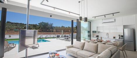 Villa, 5 habitaciones, alberca privada, vista al jardín | Restaurante al aire libre