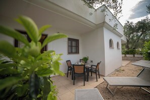 House, 1 Bedroom, Balcony, Garden View | Outdoor dining - Ferienwohnung "ulivo" mit Pool und Privatstrand -1 (Mattinata)
