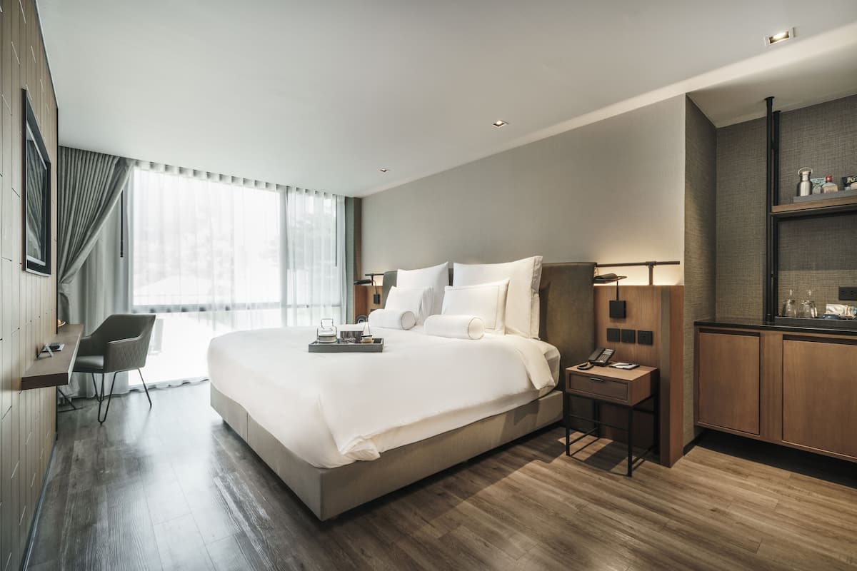 Habitación Premier | Ropa de cama de alta calidad, camas con pillow-top y minibar