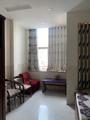 Familiekamer | Een bureau, een strijkplank/strijkijzer, gratis wifi, beddengoed