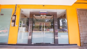 A hotel entrance with a glass door, a sign above the door reading "Welcome", and the hotel's name "Golden Pearl" on the glass. - Golden Pearl Hotel Near Universiti Tun Hussein Onn Malaysia UTHM (Batu Pahat)