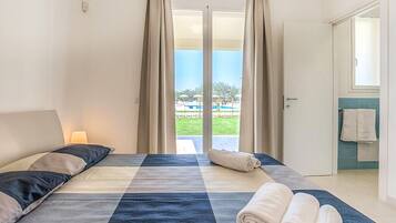 2 quartos, berço de viagem, Wi-Fi de cortesia, roupa de cama