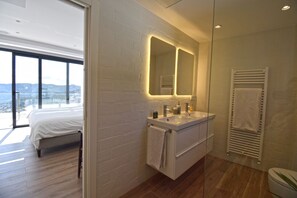 Bathtub, jetted tub, hair dryer, towels